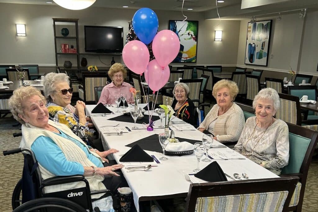 Prestonwood Court | Seniors celebrating at dinner